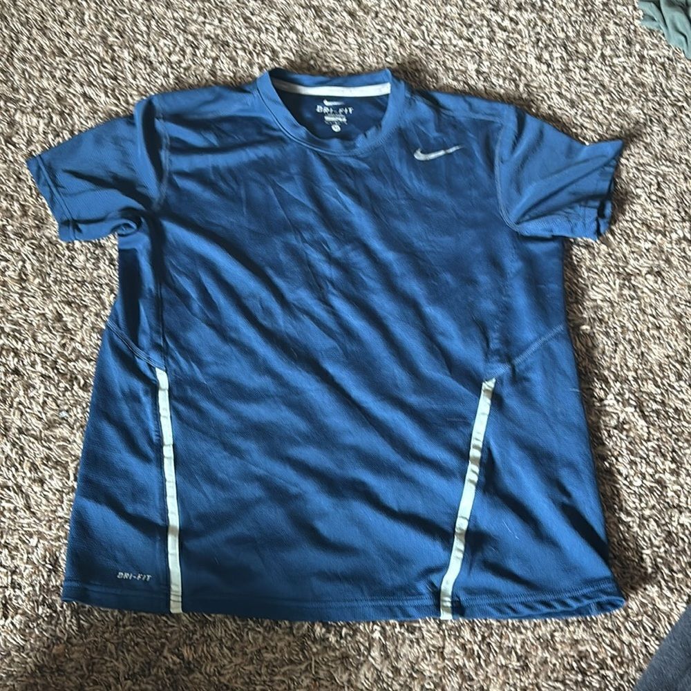 Nike dri-fit blue shirt, size M.